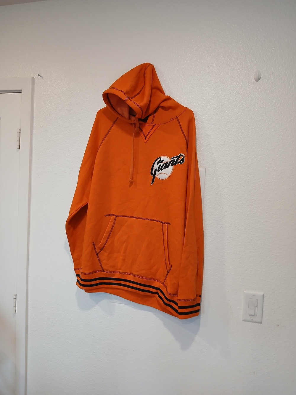 Giants Orange Pullover Hoodie with Striped Hem
